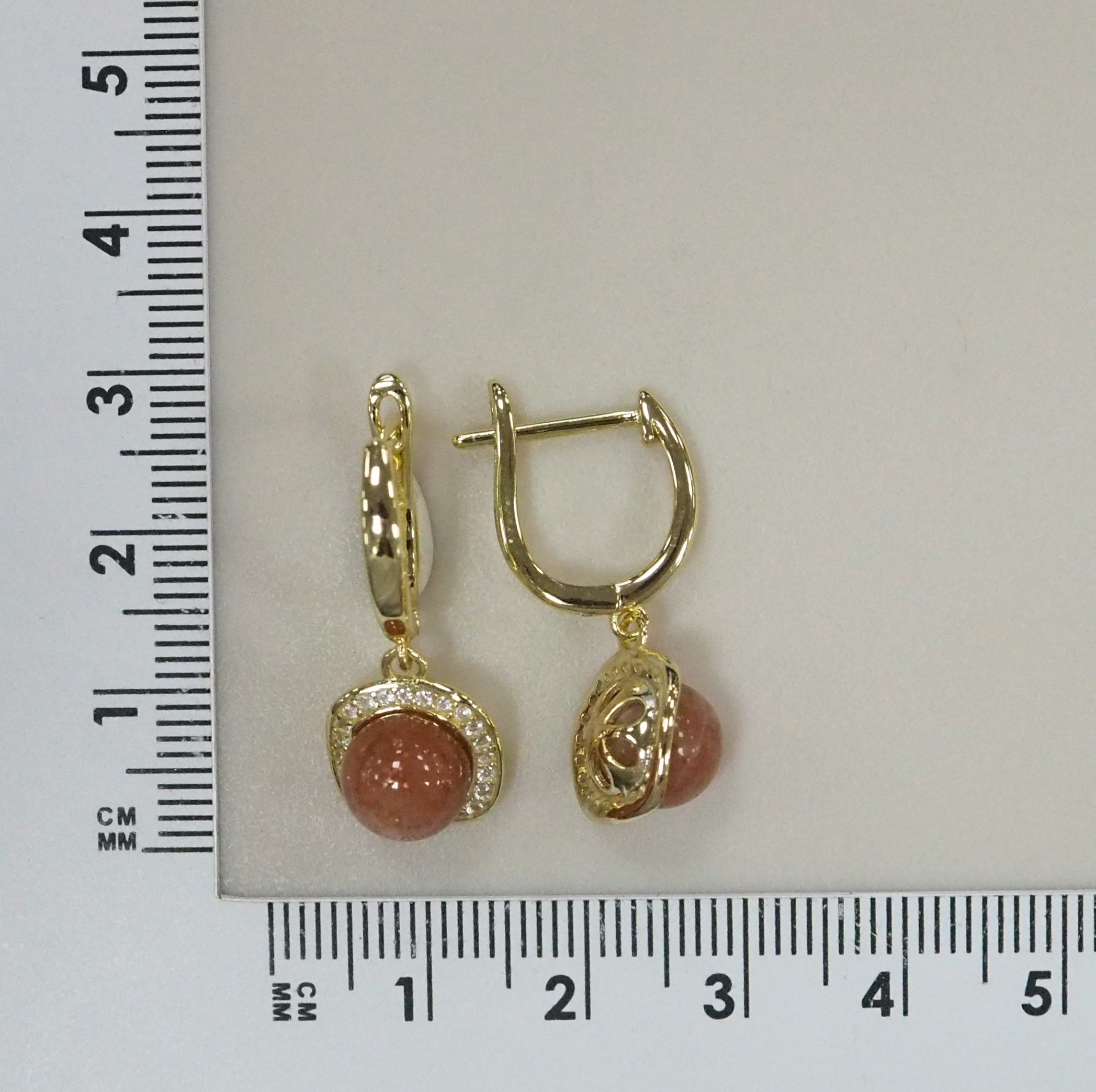 Серебряные серьги с солнечными камнями